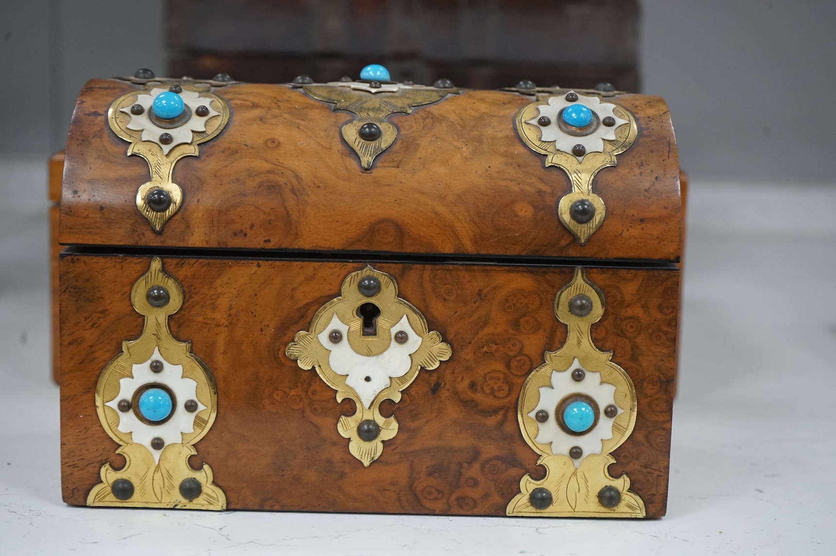 Two 19th century ivory and turquoise glass overlaid burr walnut boxes and an Indo colonial wrought iron mounted miniature chest, 28cm wide CITES Submission reference, T14WQFY5